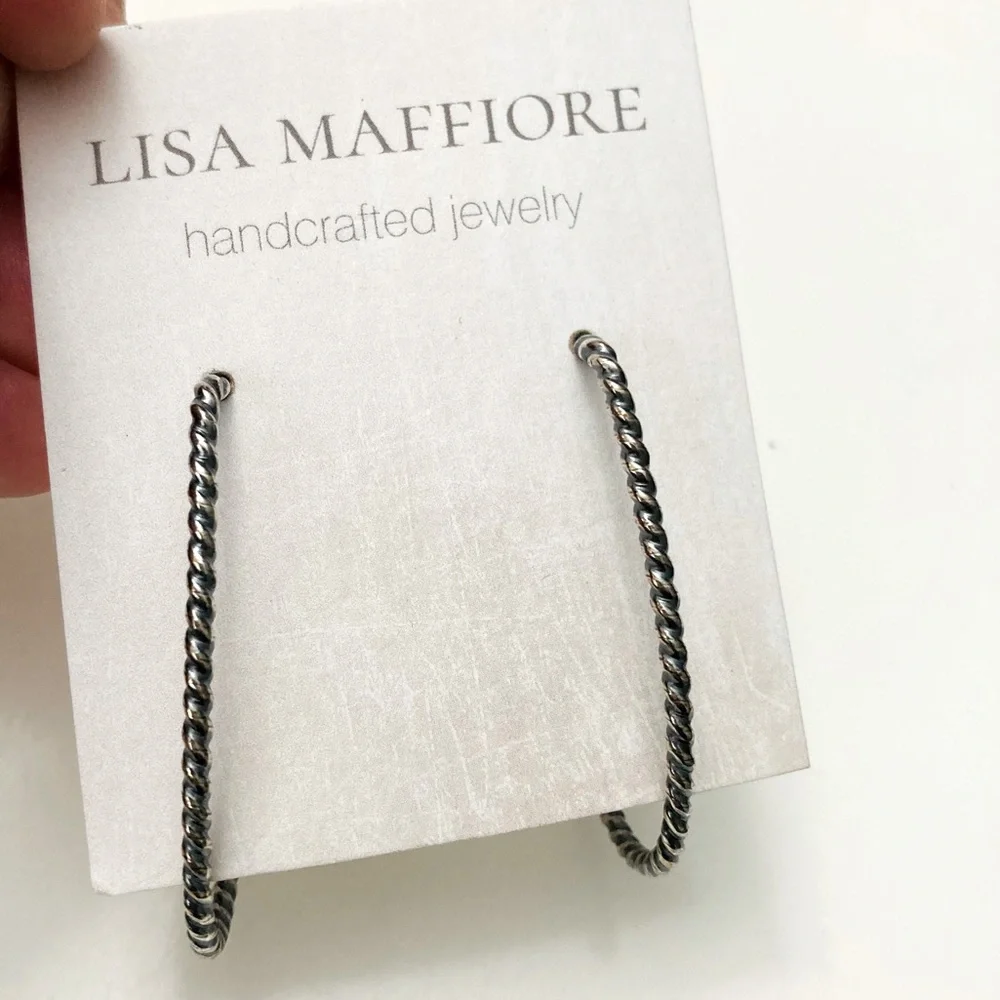 Handcrafted steel post earrings rope design